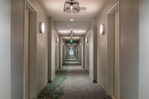 Hotel odor care and hospitality surface care — a long hotel corridor treated for odor source control and guest environment care