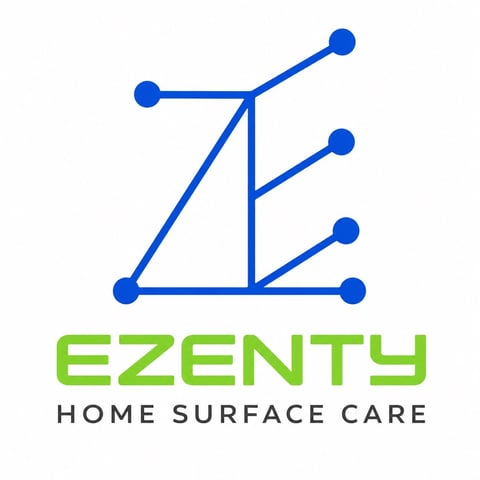 Ezenty Home Surface Care logo featuring a blue geometric house design with a roof and grid pattern above green text